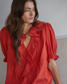 Woven Cotton V-neck short sleeve top with ruffle detail in Tomatoe Red